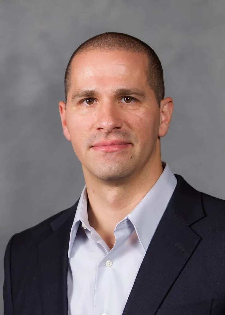 Dr. Jason Staples